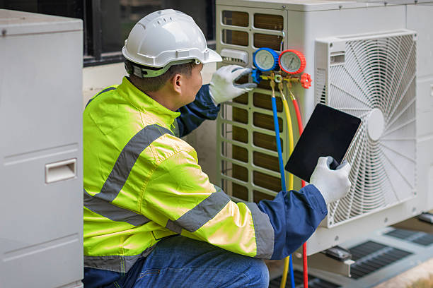 Professional Hvac Maintenance technician working in Mc Dade, TX